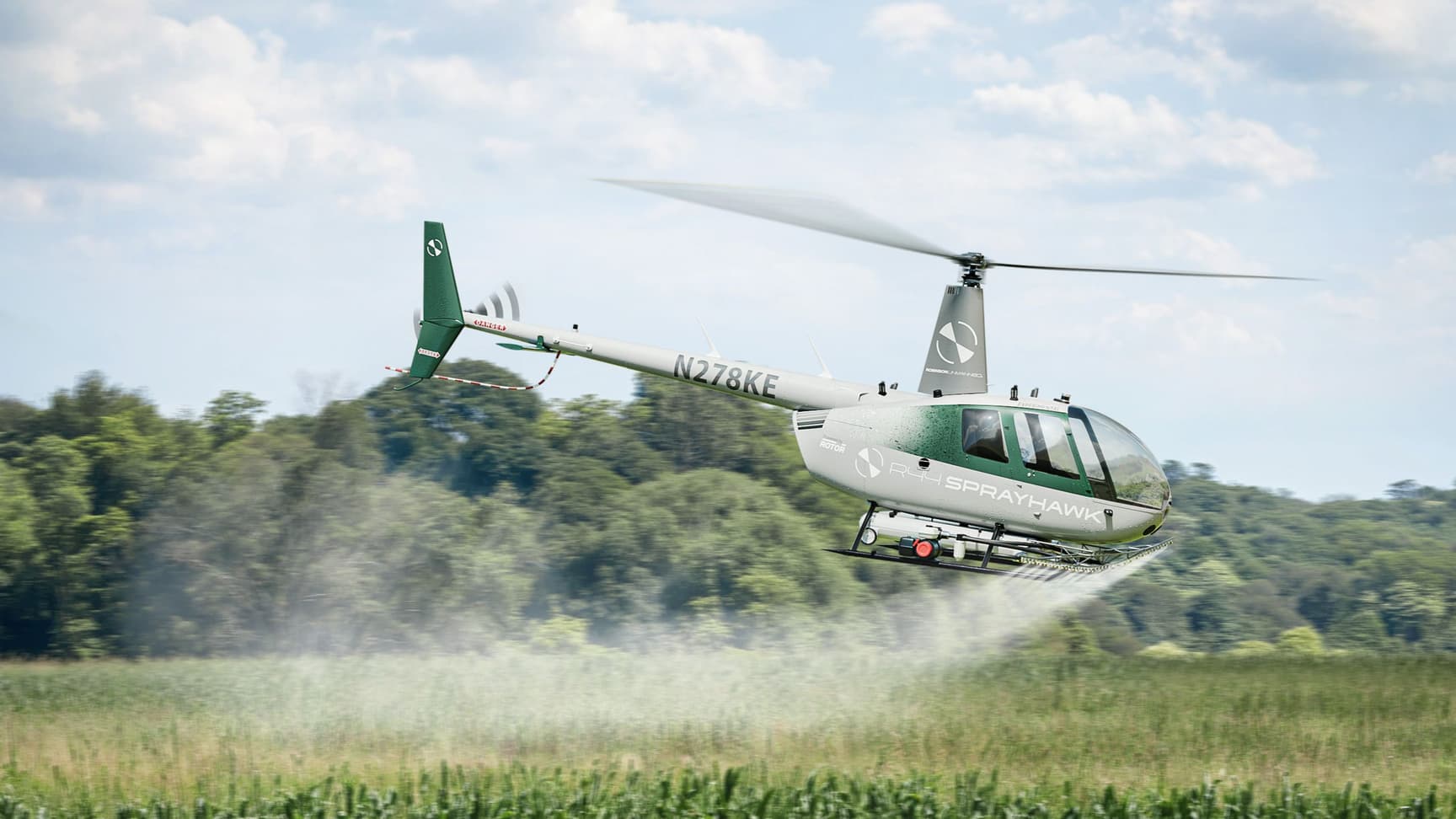 Robinson Unmanned SPRAYHAWK hero - agricultural spray drone in flight